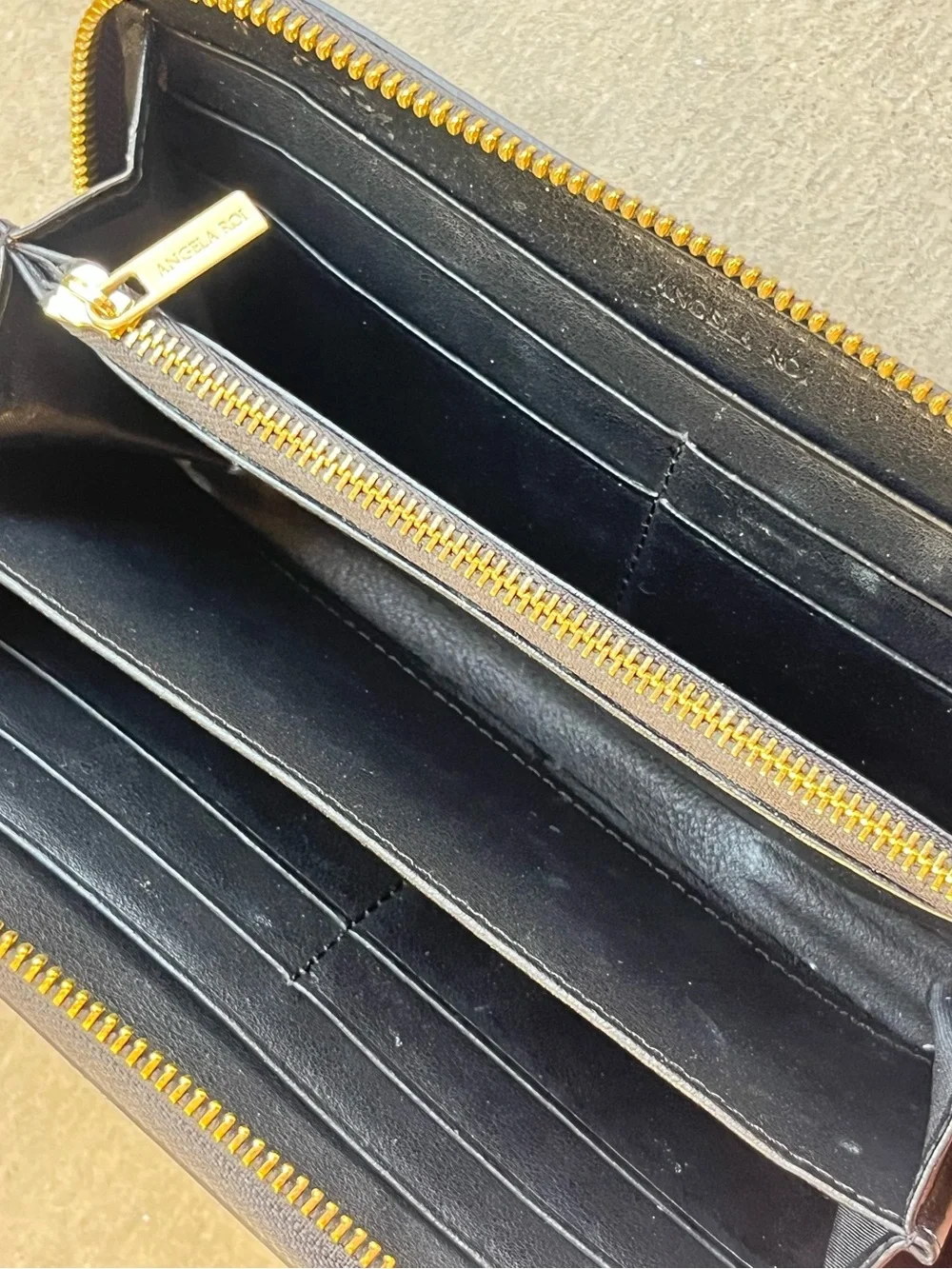Angela Roi black zip wallet